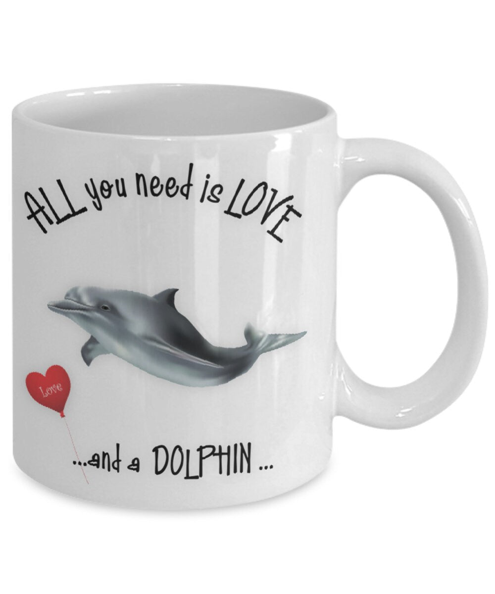 All you need is love and a dolphin ceramic coffee mug gift