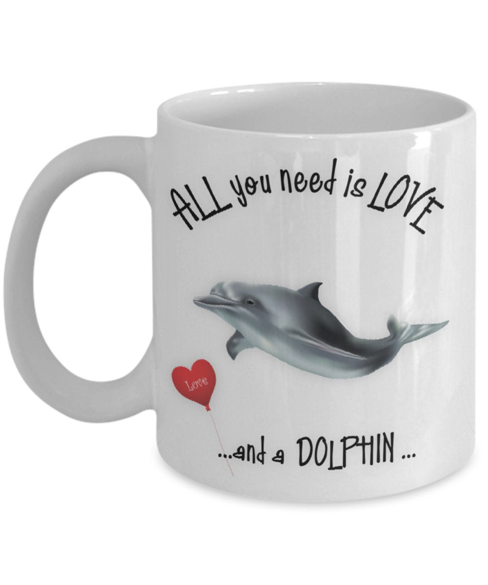 All you need is love and a dolphin ceramic coffee mug gift