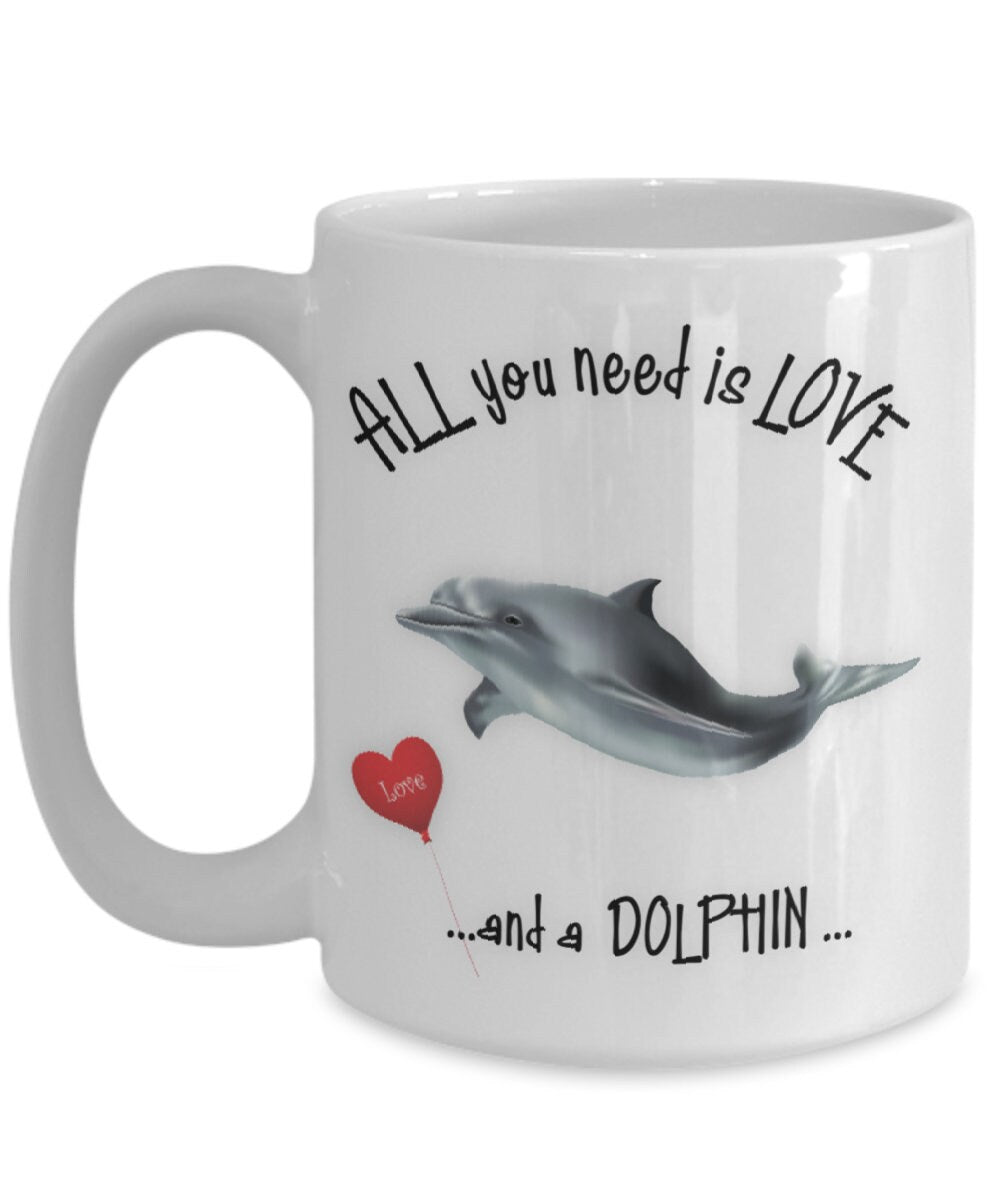 All you need is love and a dolphin ceramic coffee mug gift