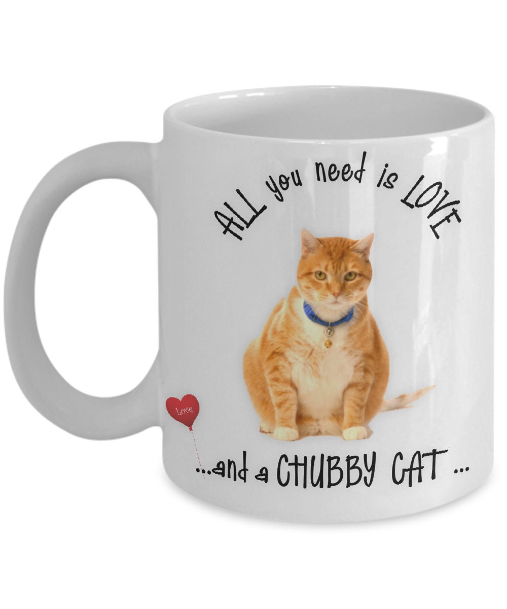 Enjoy your favorite drinks with this Chubby Cat mug and tea cup