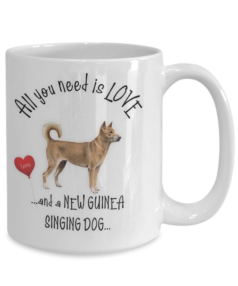 All you need is love and a Guinea Singing Dog ceramic mug